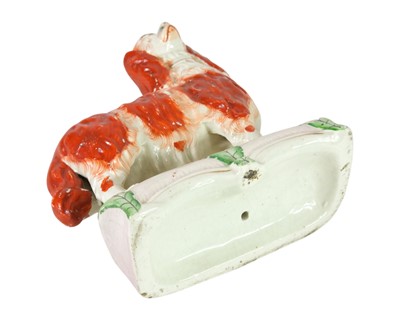 Lot 683 - A rare pair of Staffordshire spaniels.