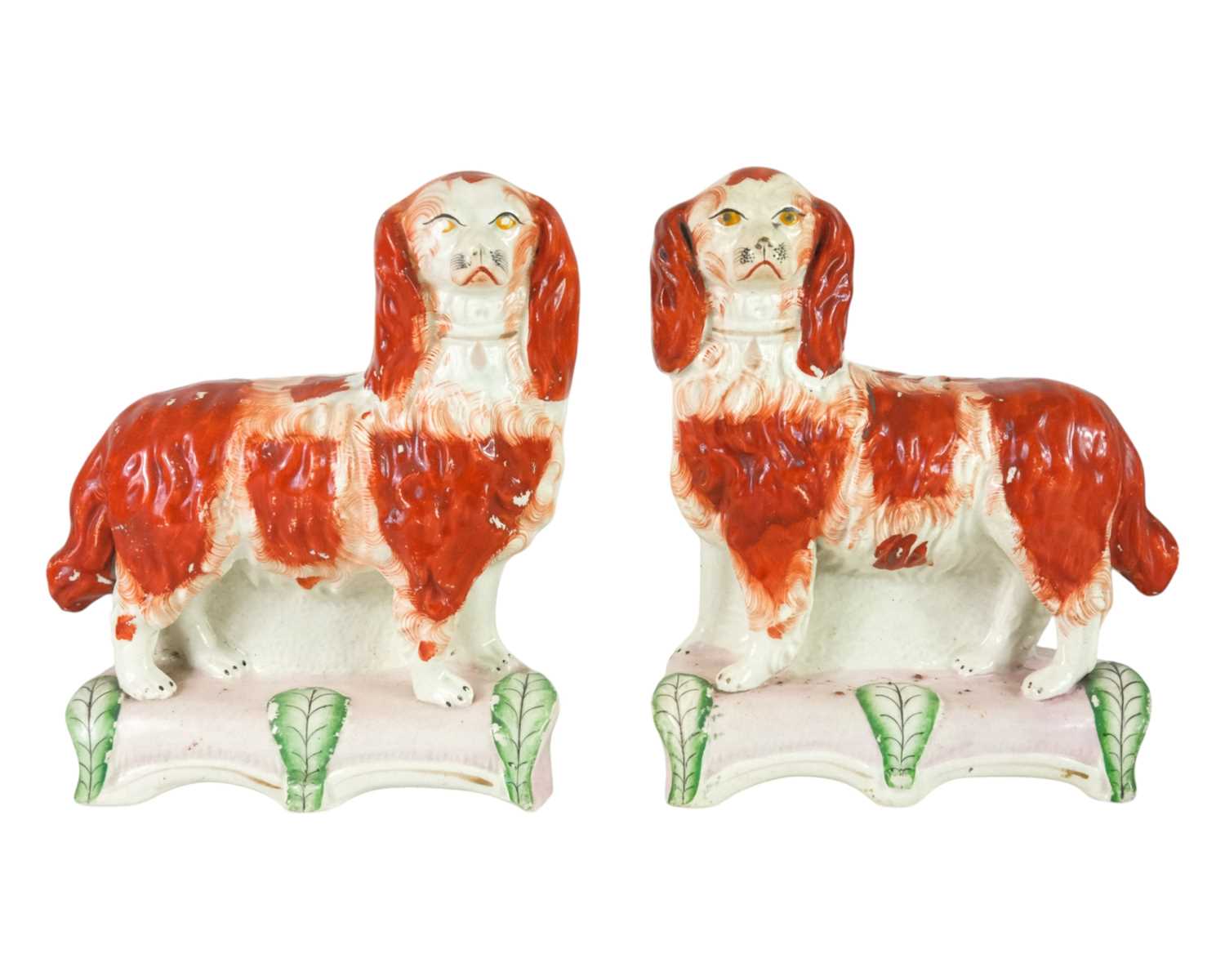 Lot 683 - A rare pair of Staffordshire spaniels.
