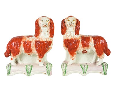 Lot 683 - A rare pair of Staffordshire spaniels.