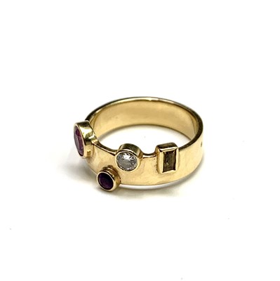 Lot 2489 - A contemporary18ct gold ring by M&M rubbed...