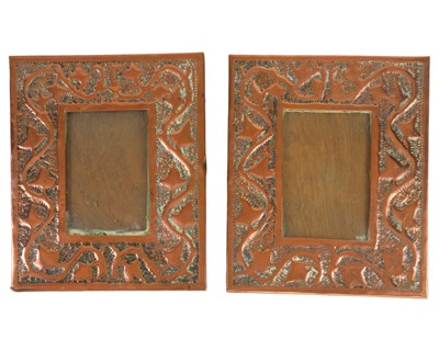 Lot 221 - A pair of Arts and Crafts copper photograph frames.