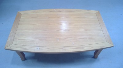 Lot 23 - A Blonde Oak Coffee Table. 45cm tall, 122cm...