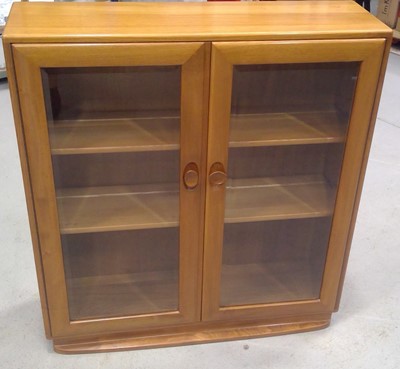 Lot 3 - An Ercol Mid-century Glazed Cabinet. 97cm tall,...
