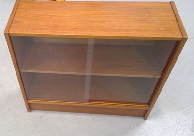 Lot 27 - A Mid-century Glazed Bookcase. 75cm tall, 82cm...