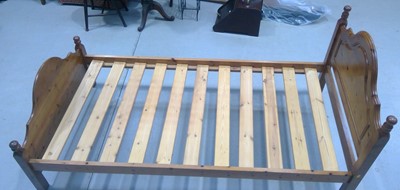 Lot 121 - A Pine Single Bed Frame. 97cm tall, 200cm long...