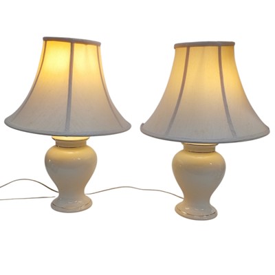 Lot 153 - A pair of ceramic base table lamps. 50cm high...