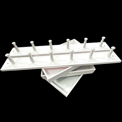 Lot 154 - Three small painted trays and two painted coat...