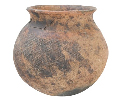 Lot 512 - An African clay cooking pot.