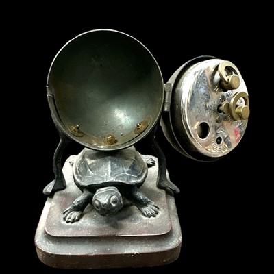 Lot 40 - An antique German-made clock sitting on a...