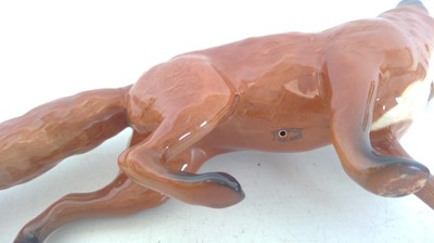 Lot 14 - A Large Beswick Fox. 14cm tall and 24cm long.