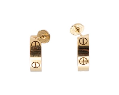 Lot CARTIER - A pair of 18k 'LOVE' hoop earrings, within original box.