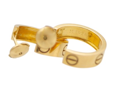 Lot 10 - CARTIER - A pair of 18k 'LOVE' hoop earrings, within original box.
