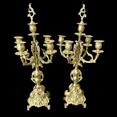 Lot 27 - A pair of gilt-brass Rococo style five-arm...
