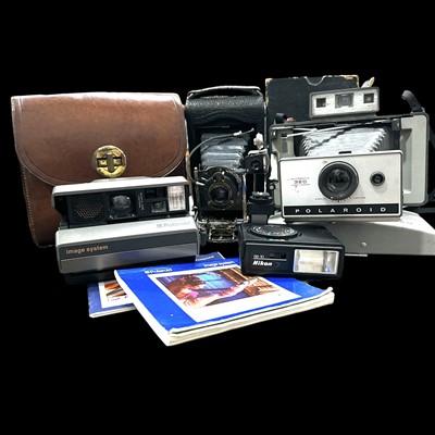 Lot 76 - Two vintage Polaroid cameras, a vintage Kodak...