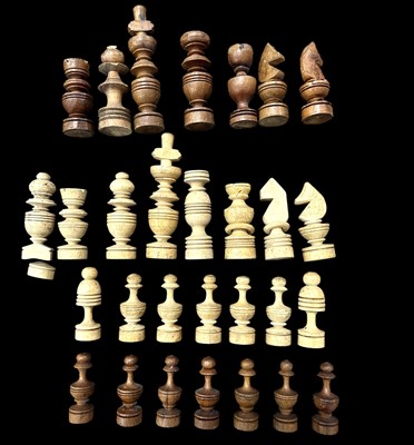 Lot 86 - A selection of scratch-built chess pieces.