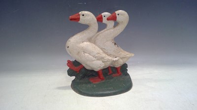 Lot 29 - A Cast Iron Doorstop in the Shape of Three...