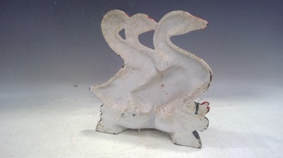 Lot 29 - A Cast Iron Doorstop in the Shape of Three...