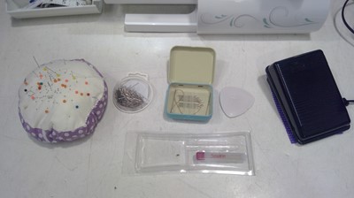 Lot 23 - A Singer Talent Sewing Machine with...