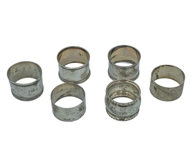 Lot 255 - Six silver napkin rings.