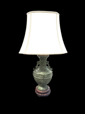 Lot 56 - A bronzed Chinese lamp, 53cm tall, including...
