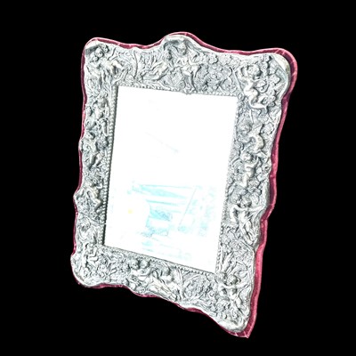 Lot 102 - A silvered resin dressing table mirror.