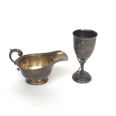 Lot 2041 - A silver sauce boat 3.1oz and a silver rowing...