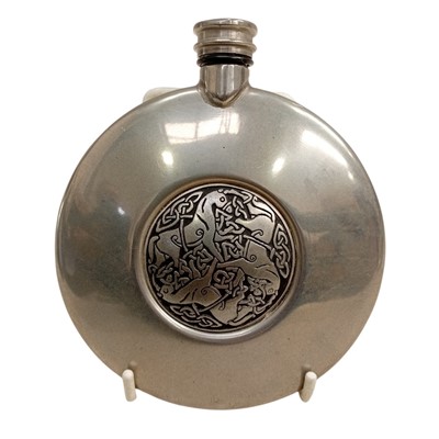 Lot 45 - A pewter flask with a Celtic horse design....