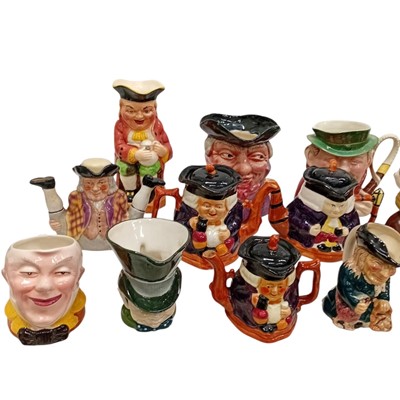 Lot 44 - A collection of Toby jugs & Teapots, including...