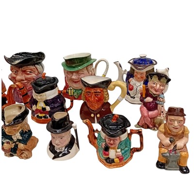 Lot 44 - A collection of Toby jugs & Teapots, including...