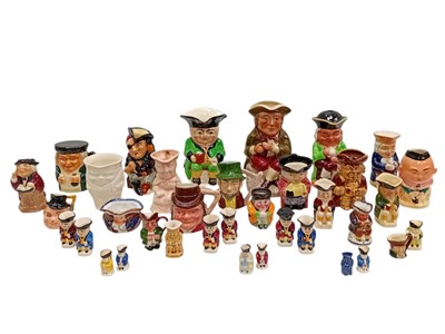 Lot 115 - A collection of over 30 Toby jugs, including...