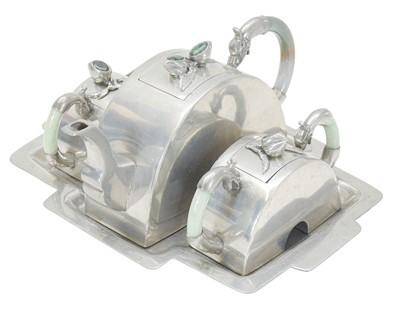 Lot 87 - A Chinese Art Deco pewter tea set.