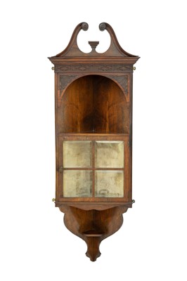 Lot 848 - A Rosewood glazed hanging corner cabinet.
