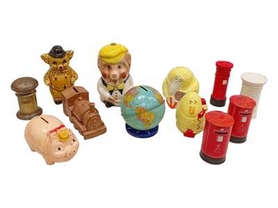 Lot 120 - A collection of Vintage money boxes, including...