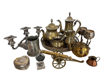 Lot 137 - A brass model of a cannon, along with other...