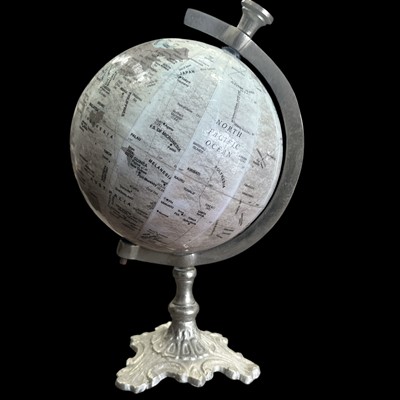 Lot 142 - A UG 15cm globe on a cast aluminium base.