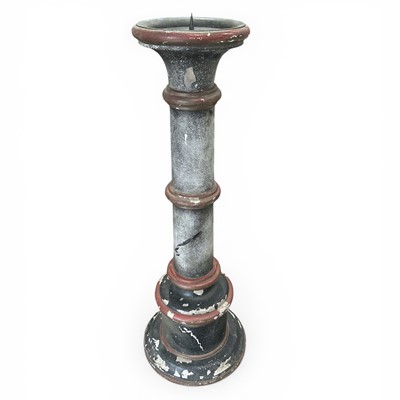 Lot 143 - A pedestal-style candle holder, 75cm tall.