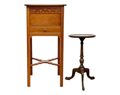 Lot 869 - A mahogany work table.