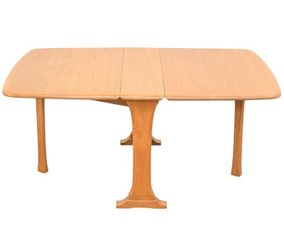 Lot 163 - An Ercol Model 820 light elm gateleg coffee table.