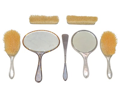Lot 407 - A silver and tortoiseshell dressing table set.