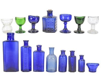 Lot 525 - A collection of glass poison bottles and eye baths.