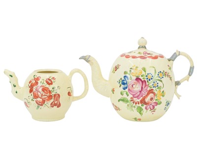 Lot 631 - An early English creamware teapot and cover.