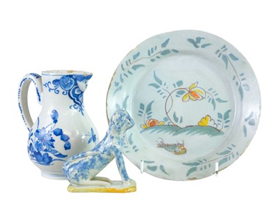 Lot 612 - An 18th century Delft jug.