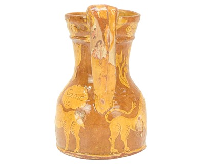 Lot 594 - A good North Devon slipware harvest jug, probably Barnstaple.