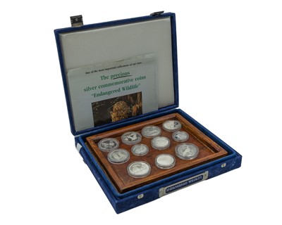 Lot 57 - SILVER PROOF COINS - A set of 23 'Endangered Wildlife' commemorative coins.