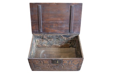 Lot 692 - A carved oak table box, dated 1711.