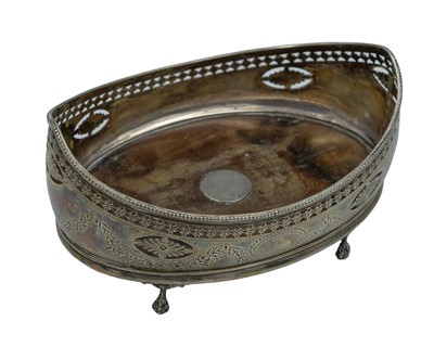 Lot 134 - A George III silver cruet stand.