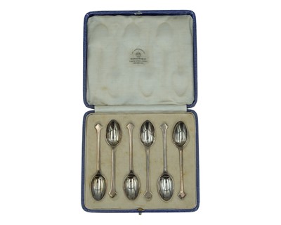 Lot 115 - A set of six silver tea spoons by Mappin & Webb Ltd.