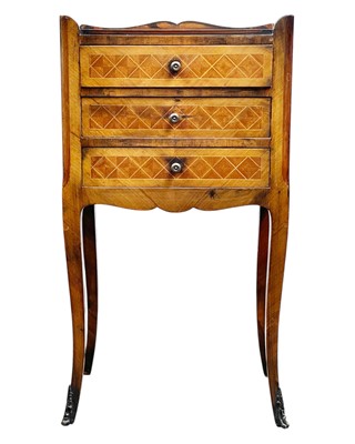 Lot 883 - A Louis XV style parquetry inlaid petit commode.