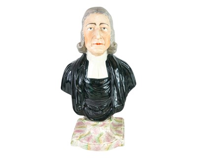 Lot 592 - A Staffordshire pottery bust of John Wesley (1703-1781).