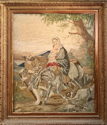 Lot 648 - A large 19th century Berlin woolwork panel, depicting 'The Flight into Egypt'.